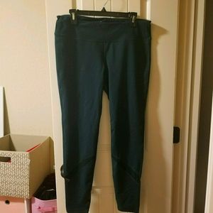 Forest green workout leggings with mesh detail